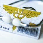 Health insurance card with a stethoscope on top