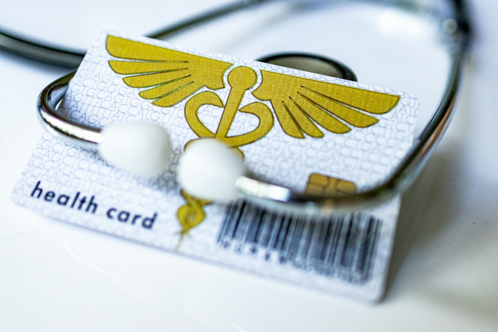 Health insurance card with a stethoscope on top