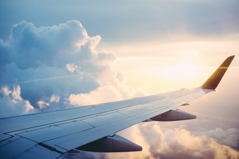 Airliner flying above the clouds
