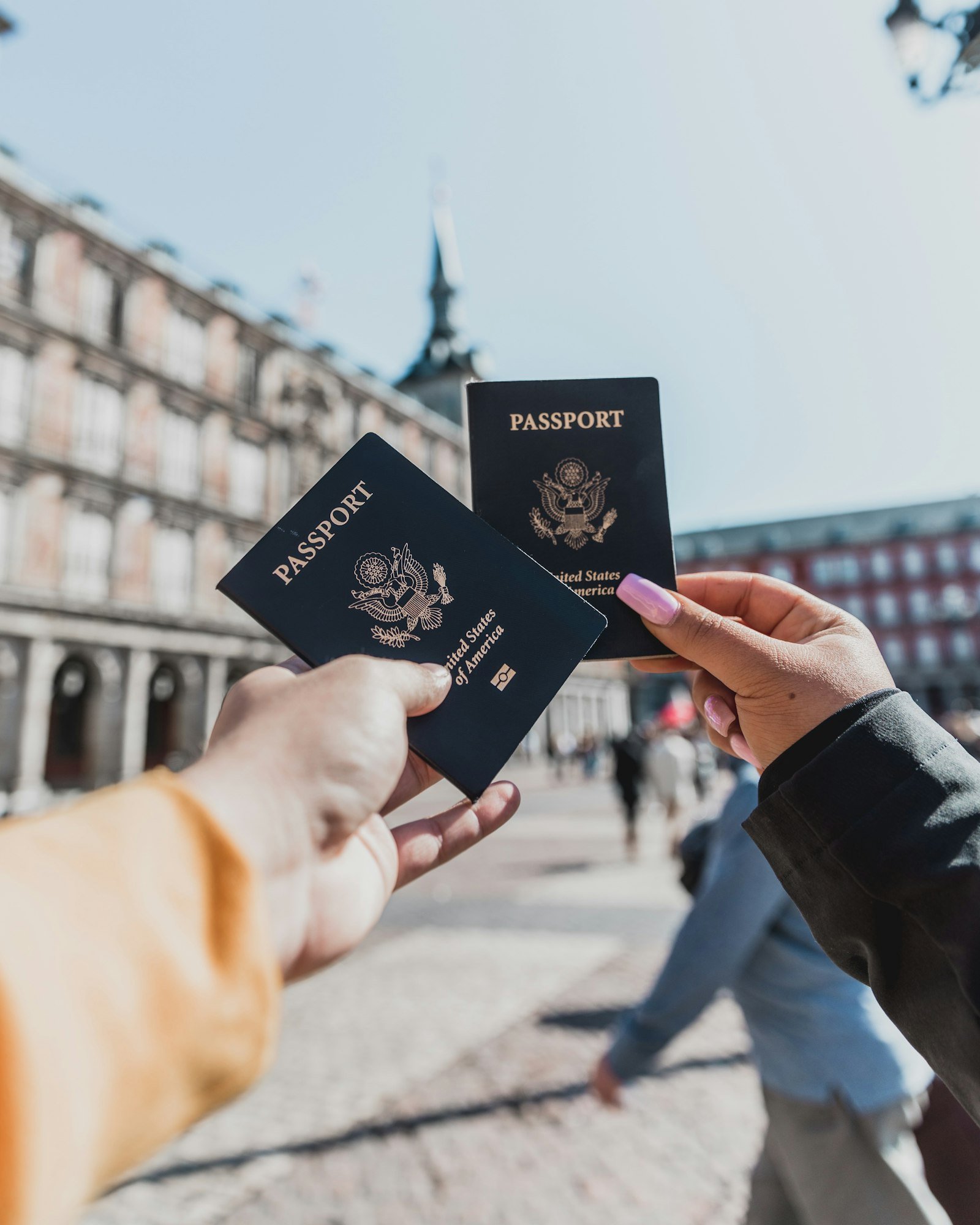 Person holding passports for travel